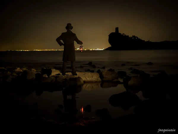 a la luz de un candil
